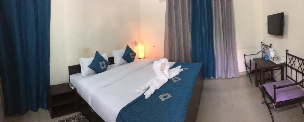 Hotel Sukhsadan Dehradun Quarto foto